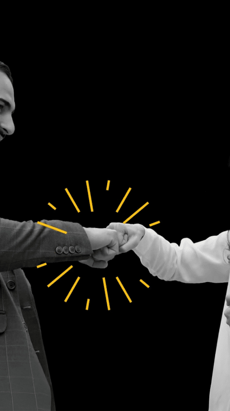 Brand video showing two professionals shaking hands on black background